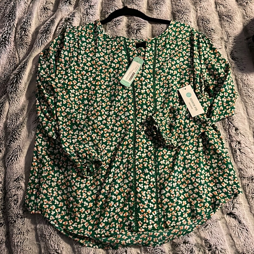 Green floral blouse